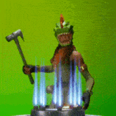 a toy dinosaur is holding a hammer on a green screen .