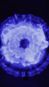 a blue and white circle with a black center