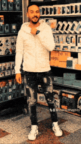 a man is standing in front of a display of phones including one that says ' smart ' on it