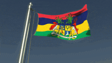 a flag with a coat of arms on it that says " liberte egalite fraternite "
