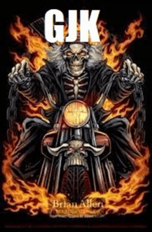 a skeleton is riding a motorcycle with flames surrounding it .