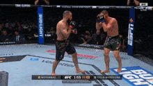 muhammad and della maddalena fighting in a ufc match