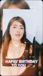 a woman 's face is behind a happy birthday to you sticker