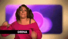 a woman in a pink sweater is dancing in front of a purple background with the name deena on the bottom .