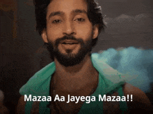 a man with a beard is smiling and says mazaa aa jayega mazaa