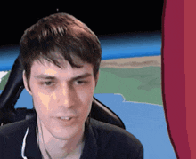 a man wearing headphones looks at the camera with a cartoon background in the background