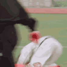 a blurry picture of a person 's feet on a track