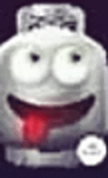 a close up of a cartoon character with a tongue out .