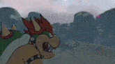a cartoon drawing of bowser looking at a red object