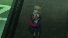 a girl in a plaid dress holds a pink guitar that says fender