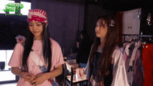 two girls standing next to each other with the words making jewels on the bottom right