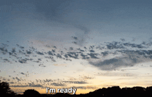 a cloudy sky with the words i 'm ready written on it