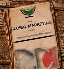 an old book titled " the global marketing show " presented by rapport international