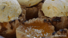 a close up of some desserts with the words made in animatica on the bottom right