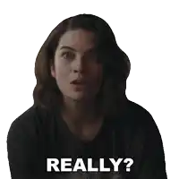 a woman in a black shirt says " really " in white letters