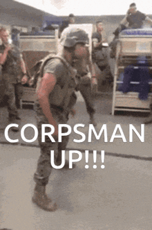 a picture of a soldier with the words corpsman up on the bottom