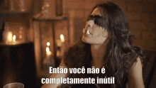 a woman with a mask on her face and the words então você não é completamente inutil