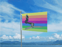 a flag with a picture of a giraffe on it is flying in the wind