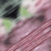 a blurred image of a pink and green background with the words svinobot news on the bottom right