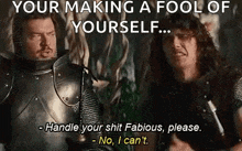 two men in armor are standing next to each other and one of them is making a fool of himself .