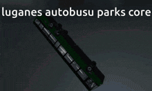 a green bus is hanging upside down with the words luganes autobusu parks core written above it