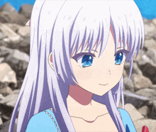 a girl with long white hair and blue eyes
