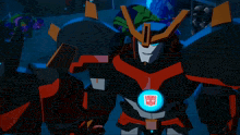 a transformer with a red and white stripe on his chest