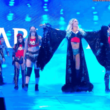 Team Raw Charlotte Flair GIF - Team Raw Charlotte Flair Asuka GIFs