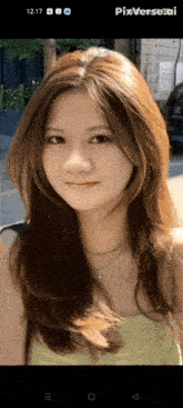 a woman 's face is displayed on a phone screen with pixverseai written on the bottom right