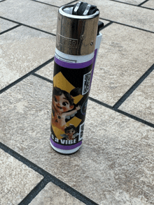 a clipper lighter with a picture of a girl and the words " it 's a vibe "