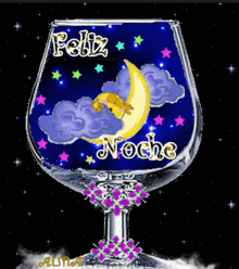a glass with a crescent moon and the words feliz noche