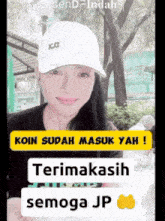 a woman wearing a white hat says koin sudah masuk yah !