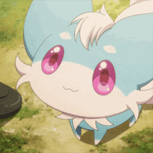 a blue and white animal with pink eyes