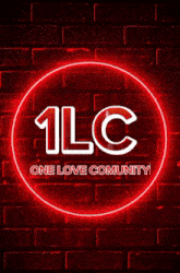 a red sign that says lg on it in front of a red brick wall