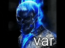 a picture of a ghost rider with blue flames coming out of his face .