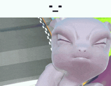 a close up of a statue with a smiley face on its face