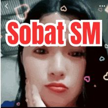 a picture of a woman with the words sobat sm above her face