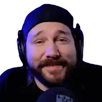 a man with a beard is wearing headphones and a hat that says lg on it