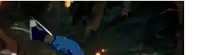 a cartoon character is standing in a dark room holding a sword