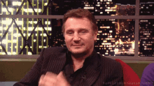 Liam Neeson Blowskiss GIF - Liam Neeson Blowskiss Wink GIFs
