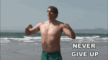 Flexing Muscles Smiling Champions Never Quit GIF - Flexing Muscles Smiling Champions Never Quit Flexing Muscles GIFs