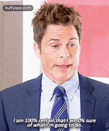 a man in a suit and tie is talking about what he 's going to do