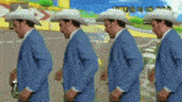 four men in suits and cowboy hats are dancing in front of a screen that says time 9