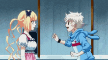a boy and a girl standing next to each other