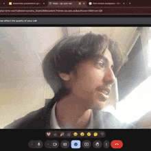 a man is talking on a video call with a google page open