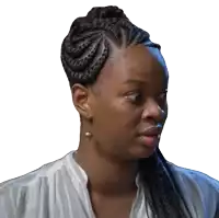 a woman with braids and earrings looks to the left
