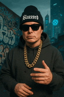 a man wearing sunglasses and a black beanie with the word blazzard on it
