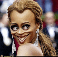 a picture of a woman with a big smile and the website www.moronface.com