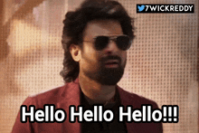 a man wearing sunglasses and a suit says hello hello hello