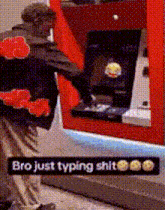 a man is standing in front of an atm machine with a sticker that says bro just typing shit